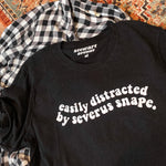 “Easily distracted by: S.S." Tee