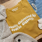 “Easily distracted by: C.D." Tee